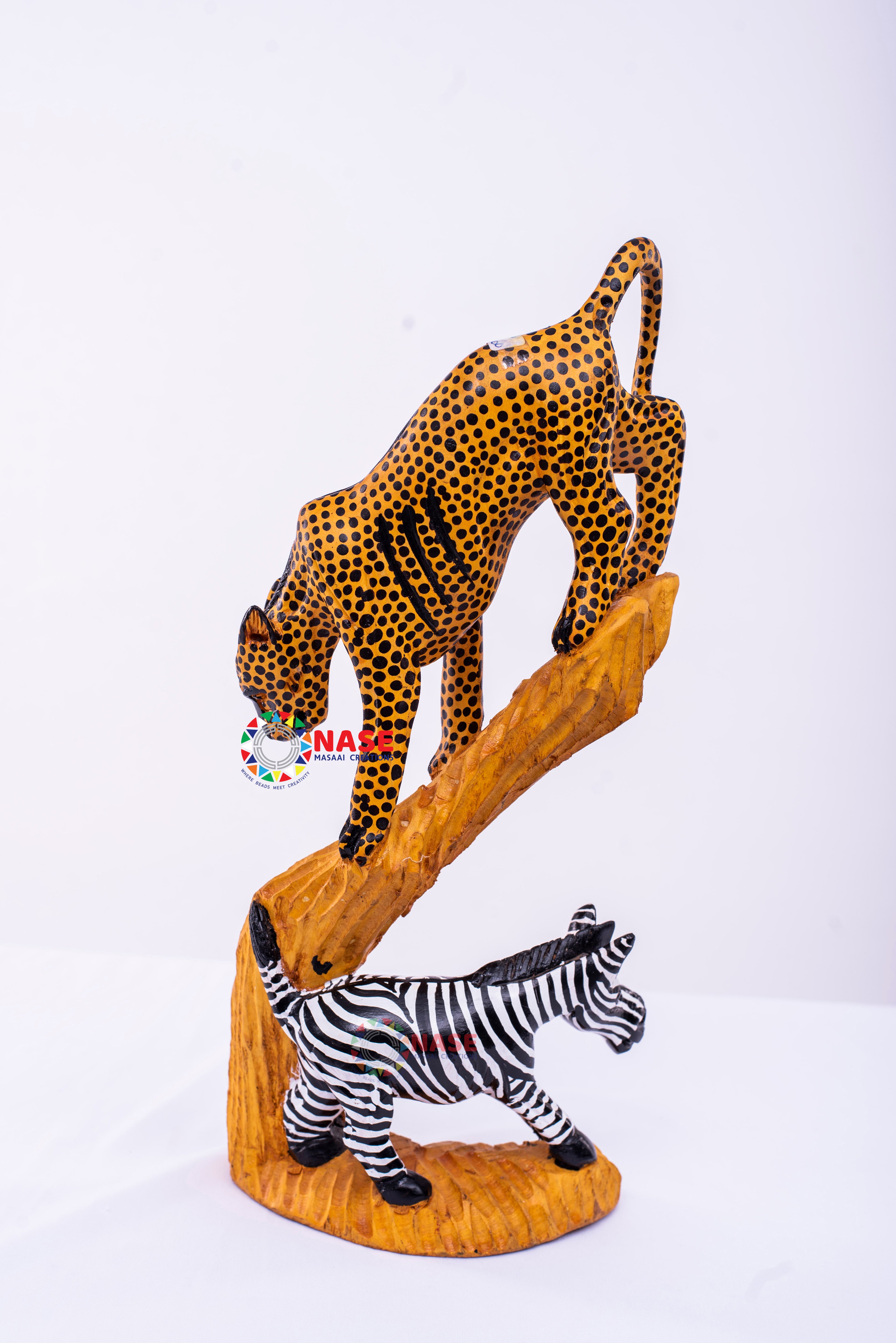 MOUNTING LION AND ZEBRA