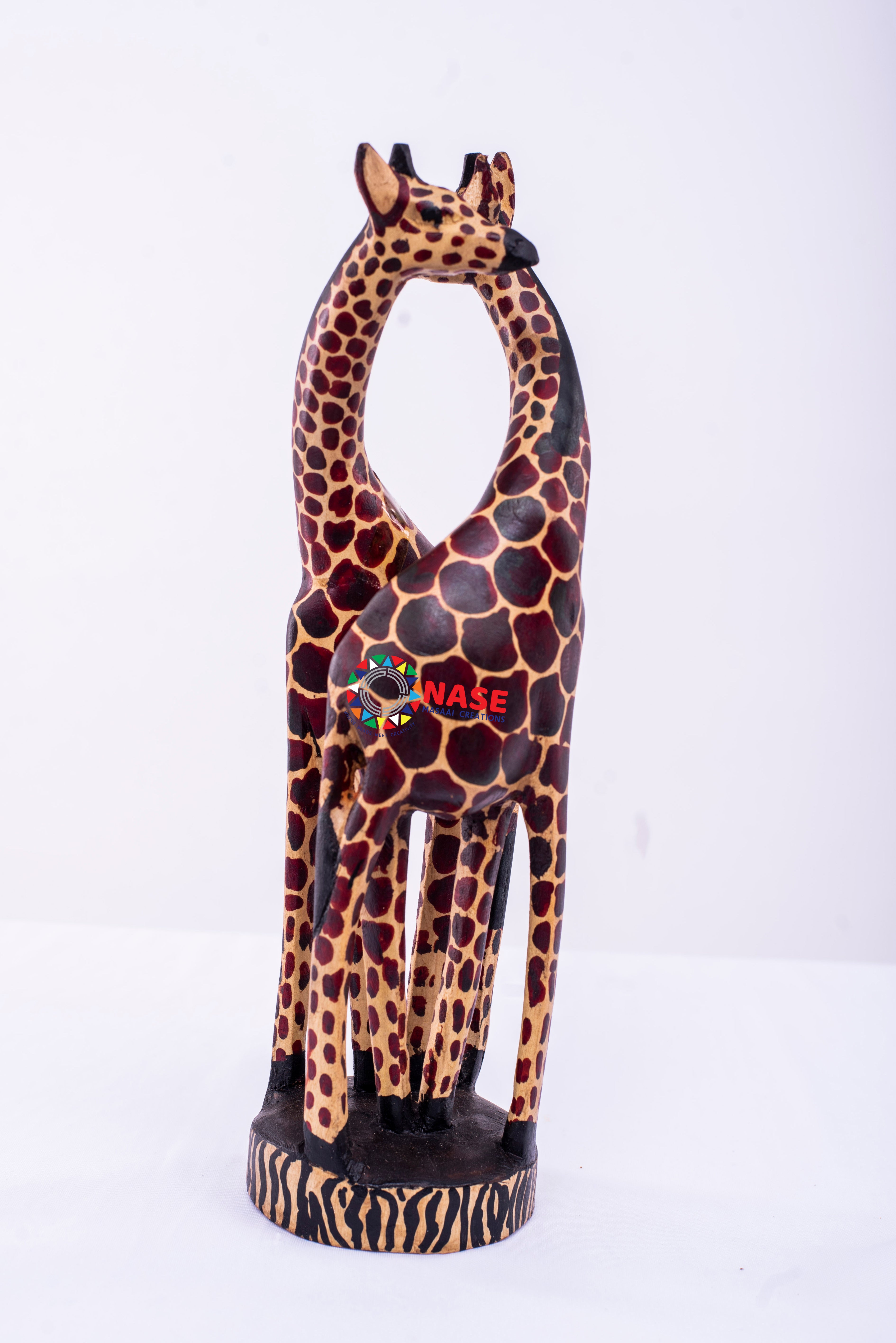 HUGGING GIRAFFE CARVINGS