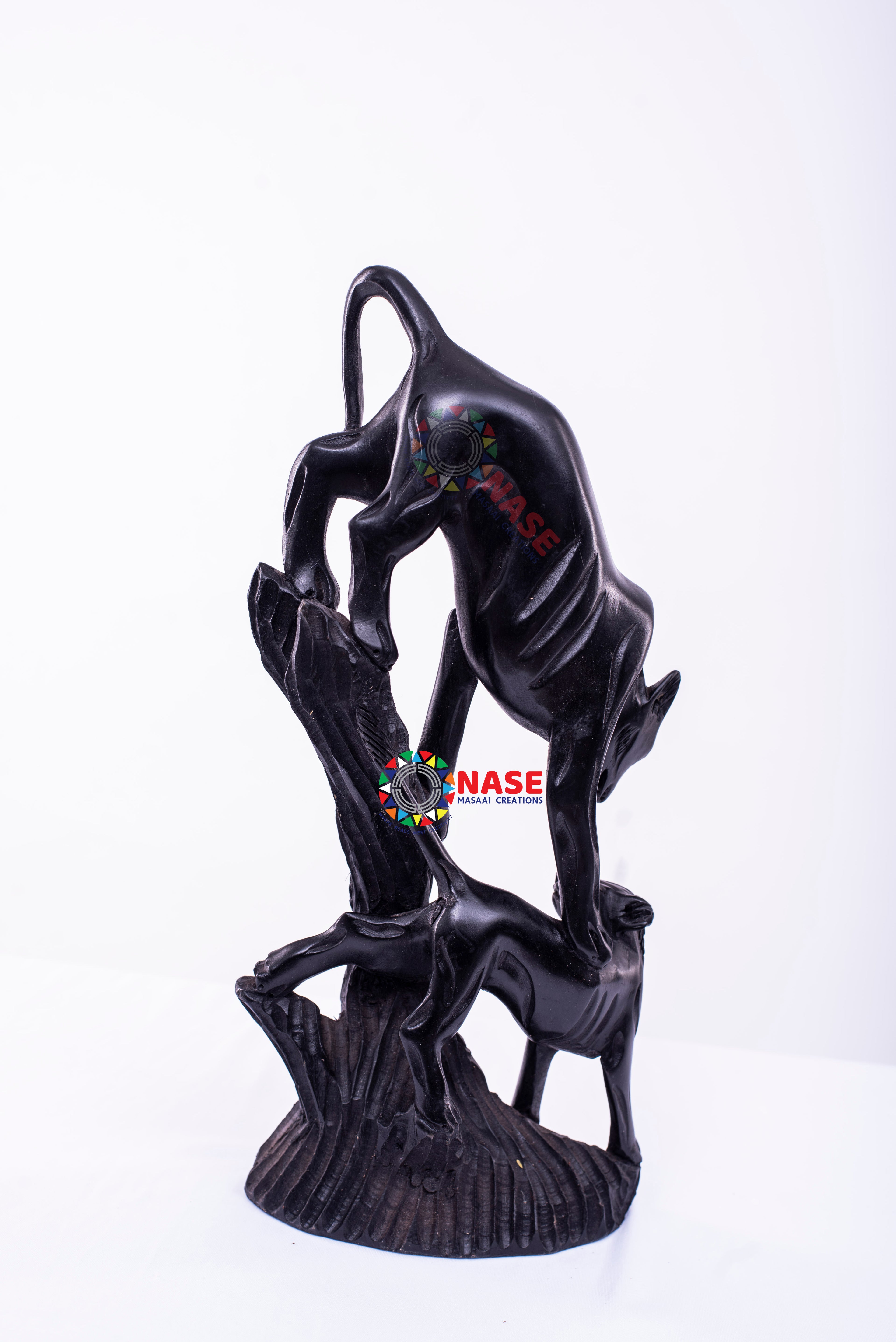 MOUNTING LION EBONY WOODEN CARVINGS