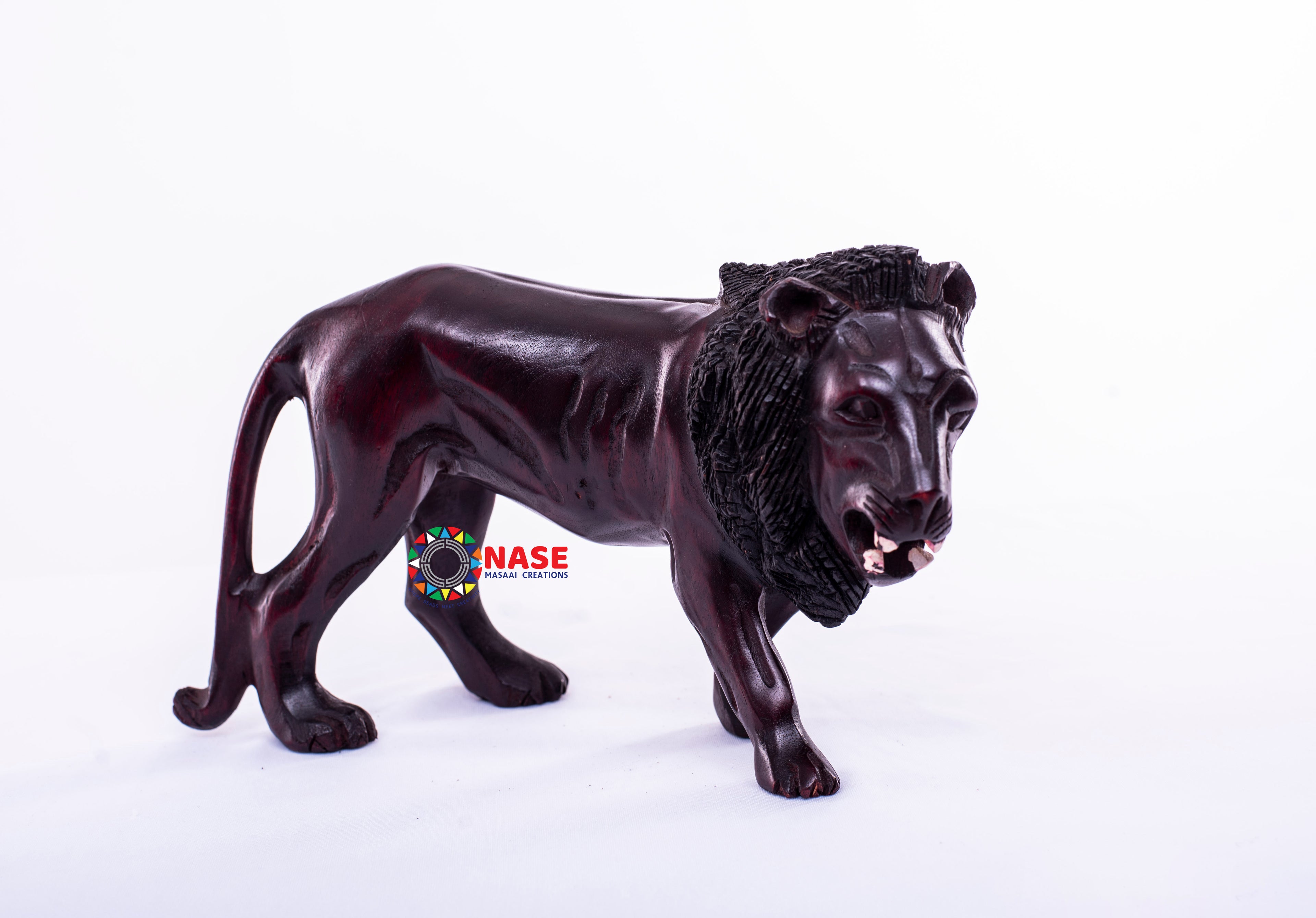 WOODEN CARVINGS OF KING LION WALKING