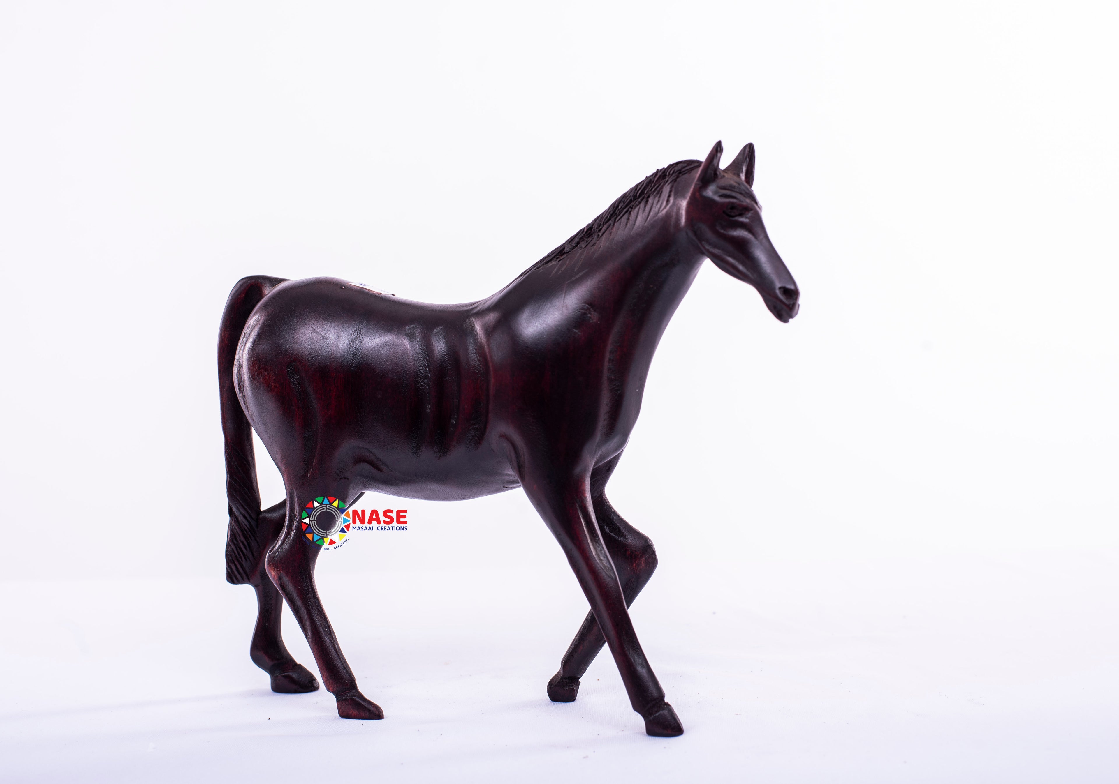 WOODEN CARVINGS OF A HORSE