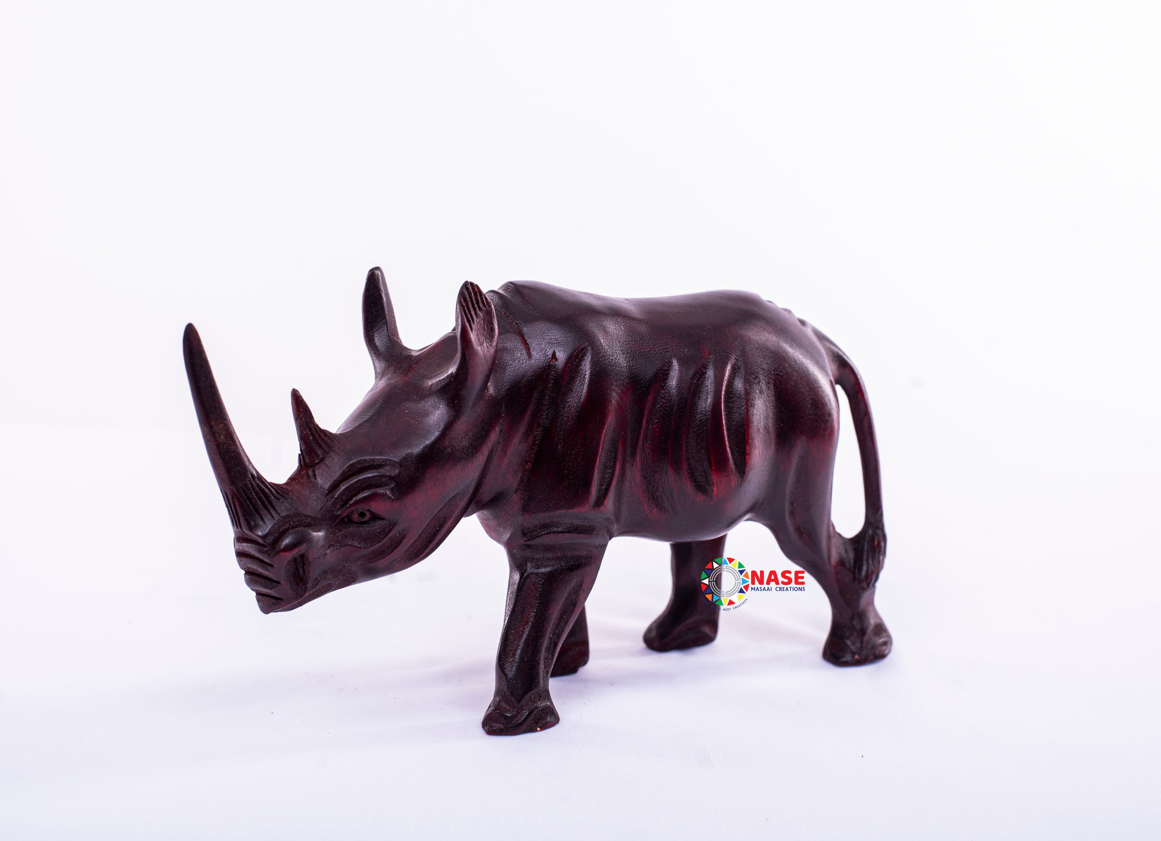 WOODEN CARVINGS OF A RHINO