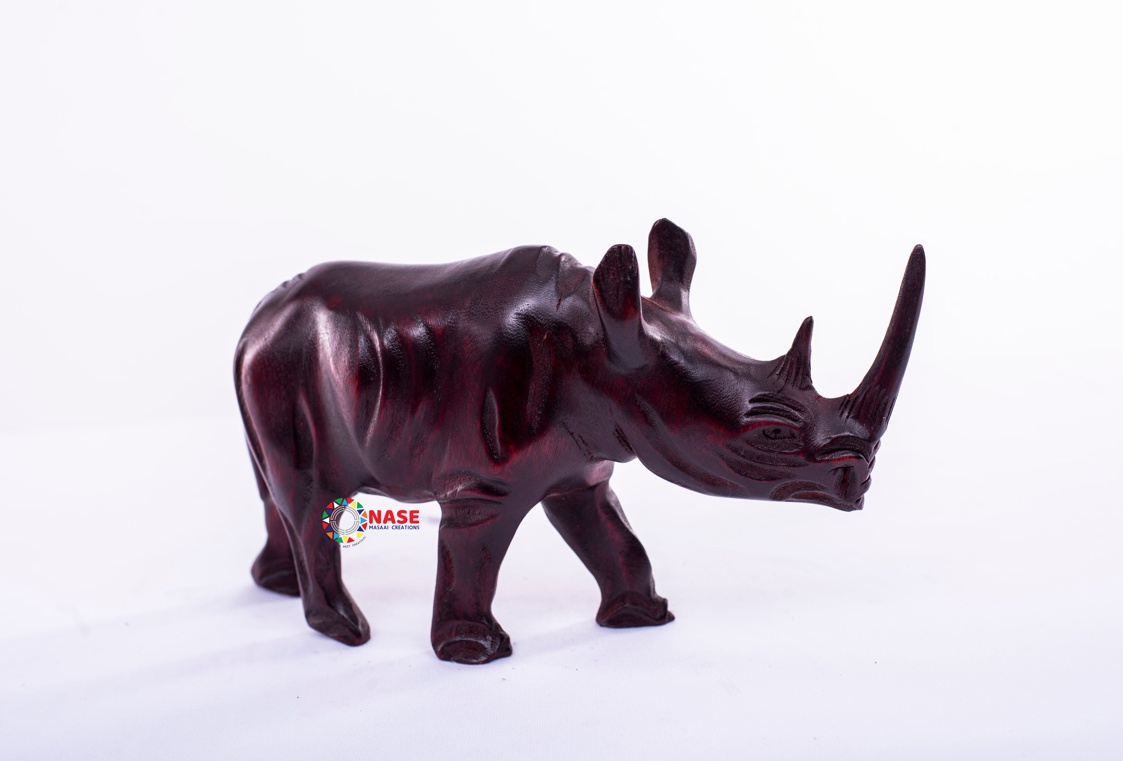 WOODEN CARVINGS OF A RHINO